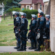 Police in riot gear wait in an alley after a second night of clashes between protesters and police in Milwaukee on Aug. 15, 2016. Hundreds of angry people have confronted police after an officer shot and killed a fleeing armed man.
Darren Hauck/Getty Images